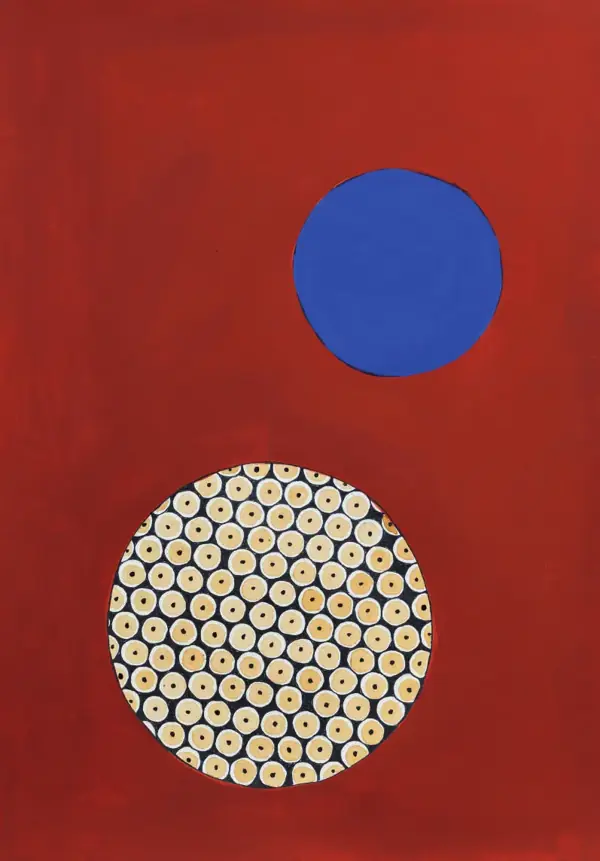 Disco azul e disco de círculos dourados sobre fundo vermelho